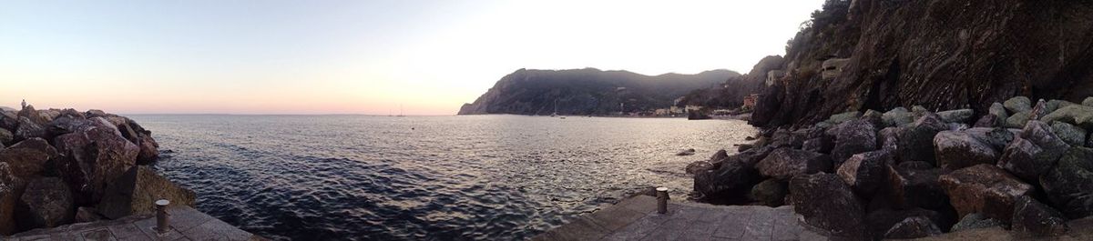 Panoramic view of sea against sky during sunset