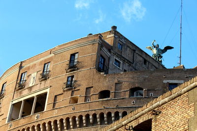 Low angle view of historic building against sky