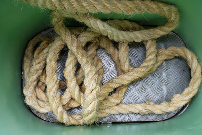 High angle view of carving on rope