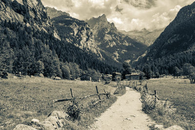 Scenic view of landscape and mountains against sky