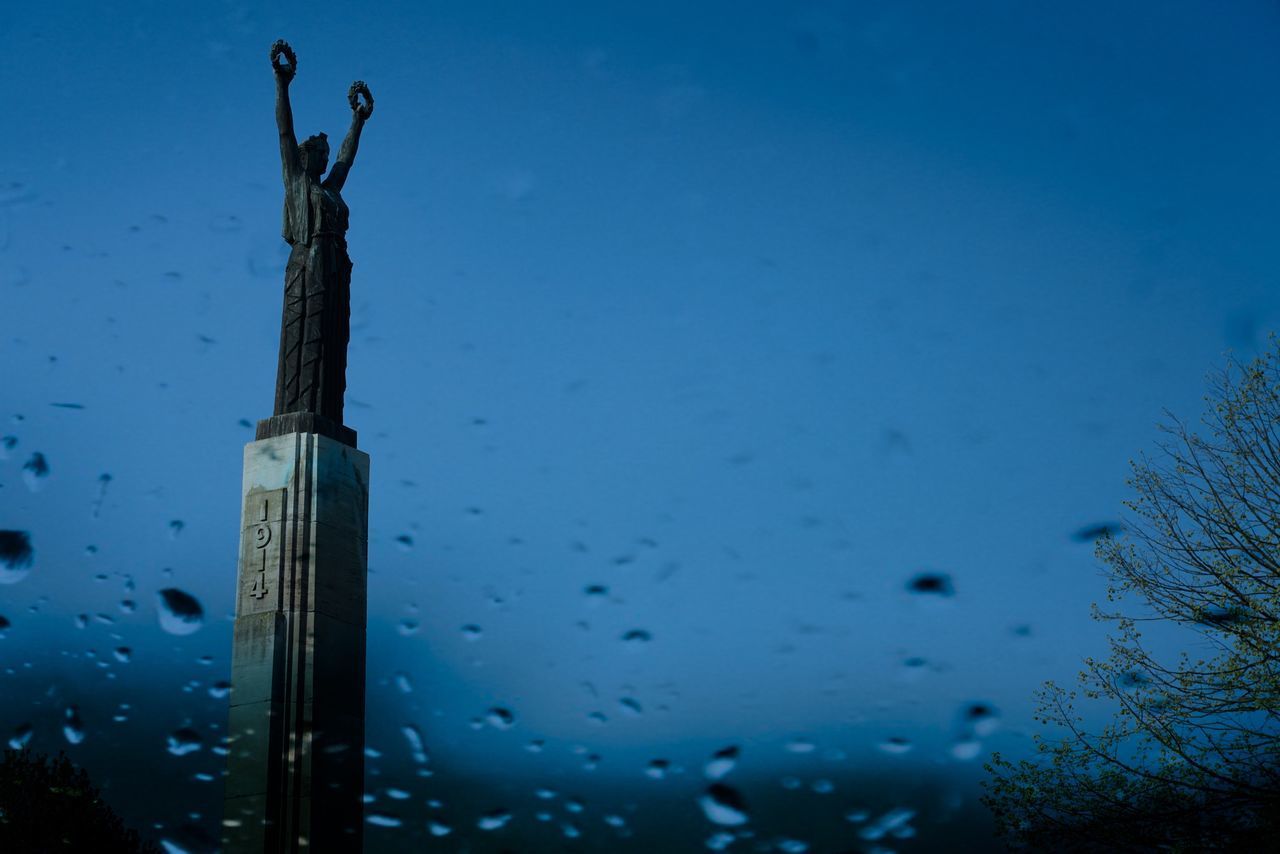 LOW ANGLE VIEW OF WET BLUE SKY