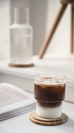 Close-up of coffee cup on table