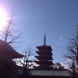 Low angle view of built structure against blue sky