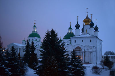 Low angle view of church against sky during winter