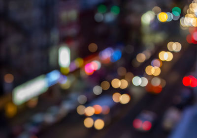 Defocused image of illuminated lights at night