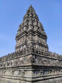 Low angle view of building against clear blue sky