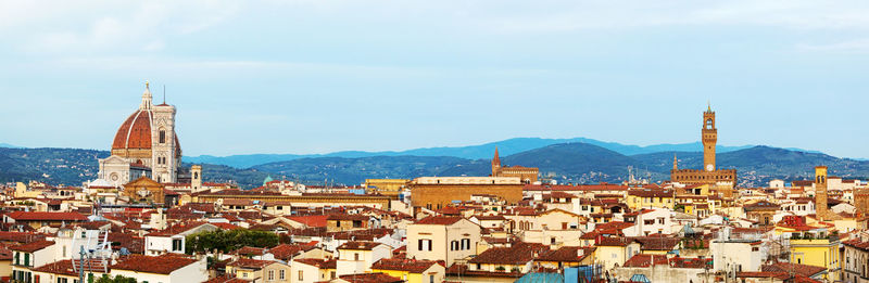 Wide angle view of florence against sky