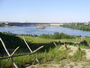 Scenic view of river against clear sky