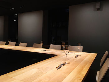 High angle view of empty chairs and table in room