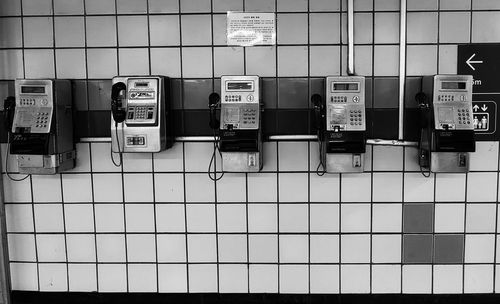 Text on wall at subway station