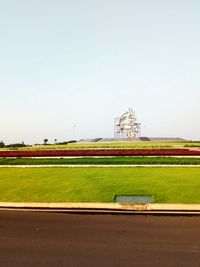 Scenic view of field against clear sky