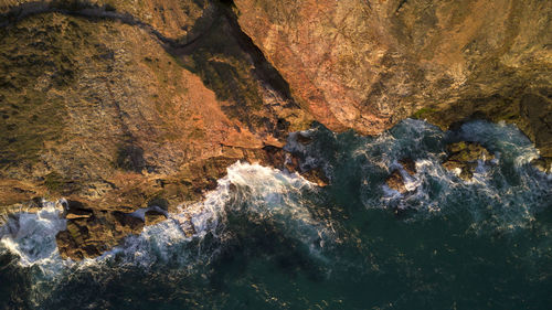 Aerial view of rock formation in water