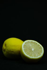 Close-up of lemon slice against black background