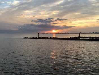 Scenic view of sea against sky during sunset