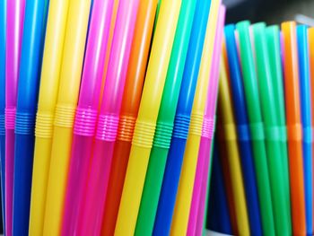 Close-up of colorful straws