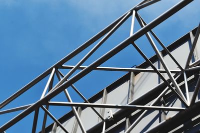 Low angle view of metallic structure against sky