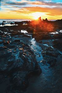 Scenic view of sea against sky during sunset
