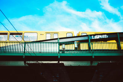 Low angle view of train against sky