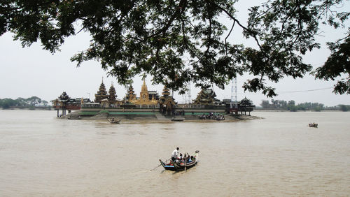 People on boat sailing in sea