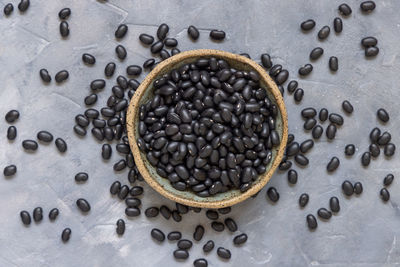 High angle view of roasted coffee beans in glass