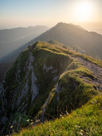 Scenic view of mountains against sky during sunset