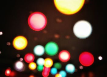 Defocused image of illuminated lights at night