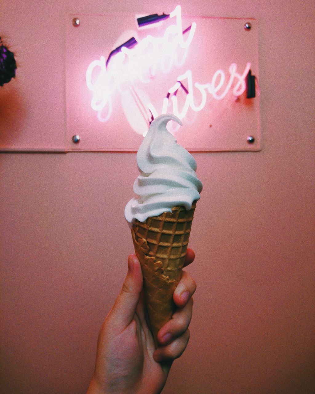 MIDSECTION OF PERSON HOLDING ICE CREAM CONE