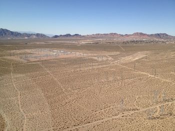 Scenic view of desert against clear sky