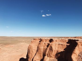 Scenic view of desert against sky