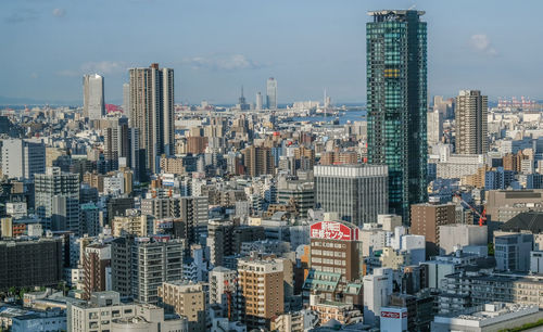 High angle shot of cityscape against the sky