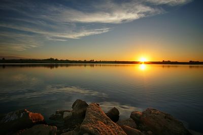 Scenic view of sunset over river