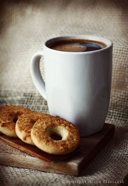 indoors, food and drink, coffee cup, table, still life, drink, coffee - drink, refreshment, freshness, close-up, coffee, saucer, cup, breakfast, spoon, no people, food, selective focus, high angle view, wood - material