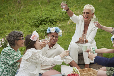 People having picnic during midsummer