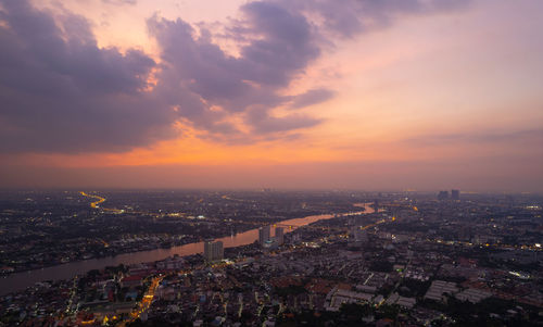 High angle view of cityscape against sky during sunset