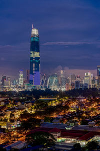 Illuminated buildings in city at night