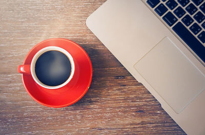 High angle view of coffee cup on table