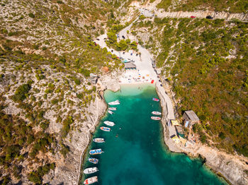 High angle view of rock formations by sea