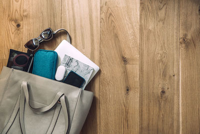 High angle view of personal accessories on table