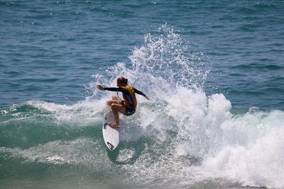 Man surfing on sea