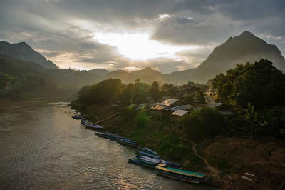 High angle view of town at sunset