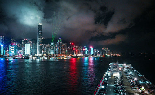 High angle view of illuminated buildings in city at night