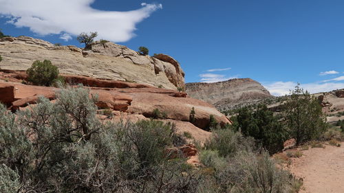 Low angle view of rocks against sky