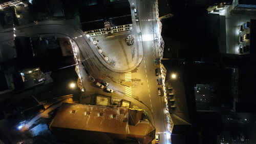 Close-up of illuminated machinery at night