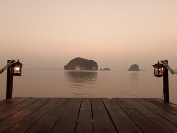 Scenic view of sea against clear sky during sunset