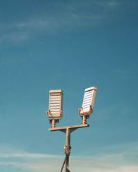 Low angle view of basketball hoop against sky