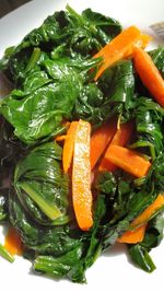 High angle view of chopped vegetables in plate