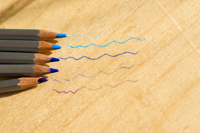 High angle view of colored pencils on table