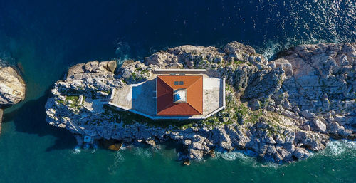 High angle view of house by sea