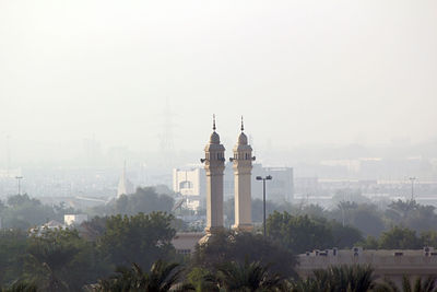 View of minarets of mosque in city