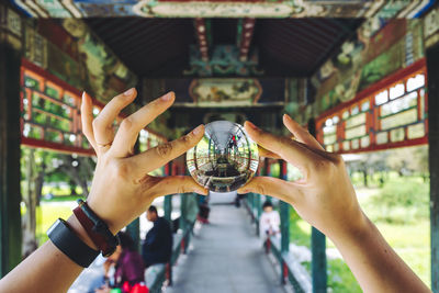 Close-up of man hand holding built structure